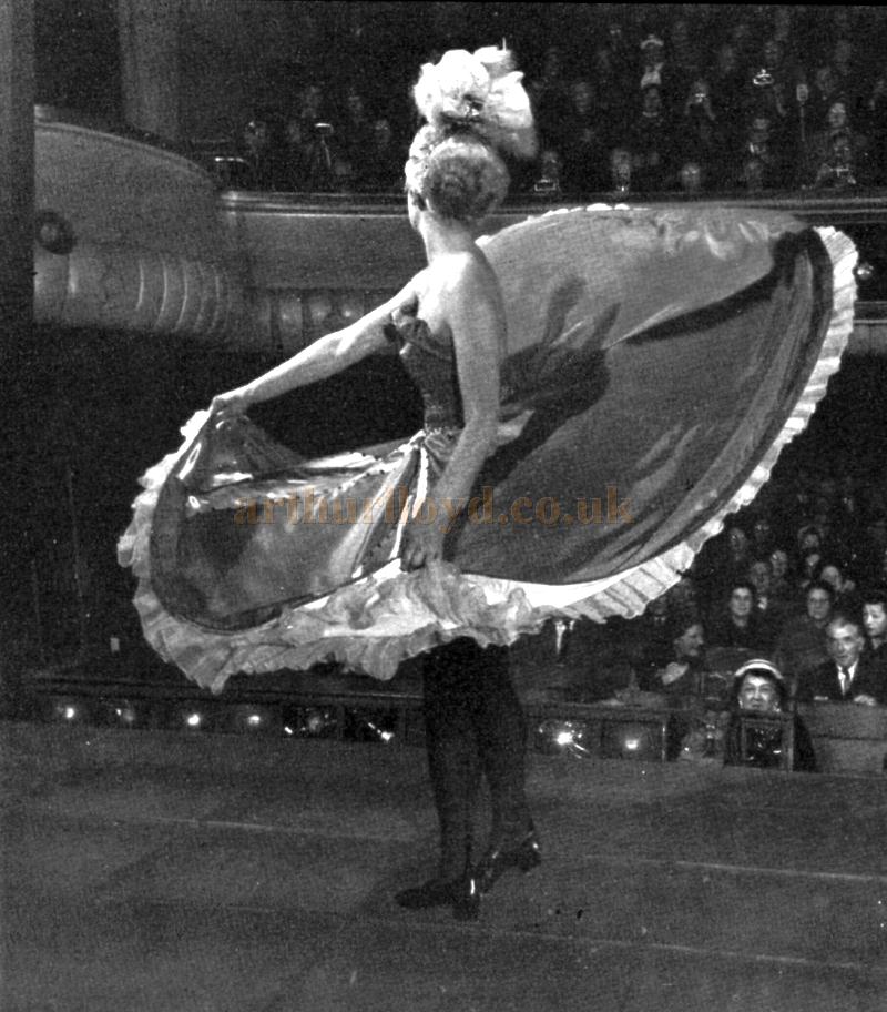 Dress rehearsal, with Rosemary Philips on stage. In the auditorium, various members of a camera club who go to the Windmill from time to time to practice their stage photography.