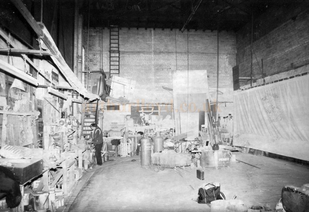 Scenic Artist David Perry working in the former Stage of the Empire Theatre, Smethwick in the 1980s - Courtesy Michael Perry.