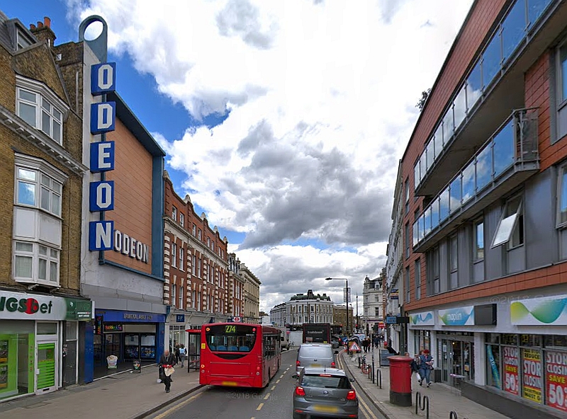 A Google StreetView Image showing the main entrance to the Odeon Cinema, Camden, formerly the Gaumont Palace Theatre, in March 2018 - Click to Interact.