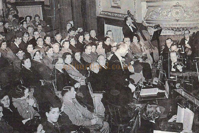 An audience and the orchestra of the Grand Theatre, Derby in the 1950s - Courtesy John West