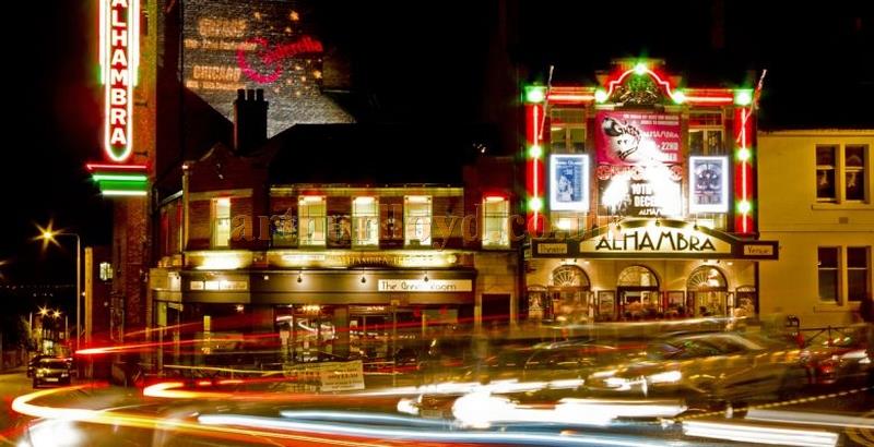 The Alhambra Theatre, Dunfermline at night and showing its reinstated neon sign - Courtesy WelcomeToFife.com