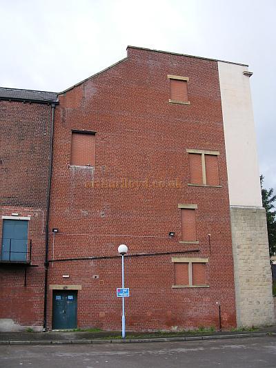 The side elevation of the Nelson Palace Theatre in a photograph taken in August 2009 showing the 1983 'sawn off' facde - Courtesy Neil Foster.